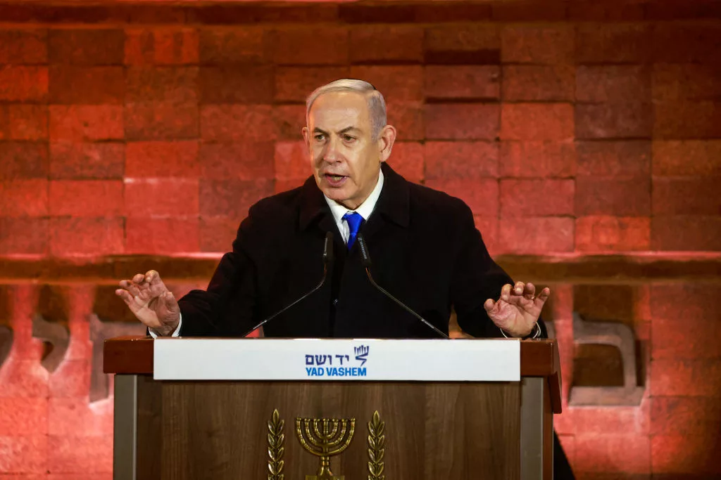 Israel's Prime Minister Benjamin Netanyahu speaks during a ceremony marking Holocaust Remembrance Day for the six million Jews killed during World War II, at the Yad Vashem Holocaust Memorial in Jerusalem on May 5, 2024. (Photo by Menahem Kahana / AFP)