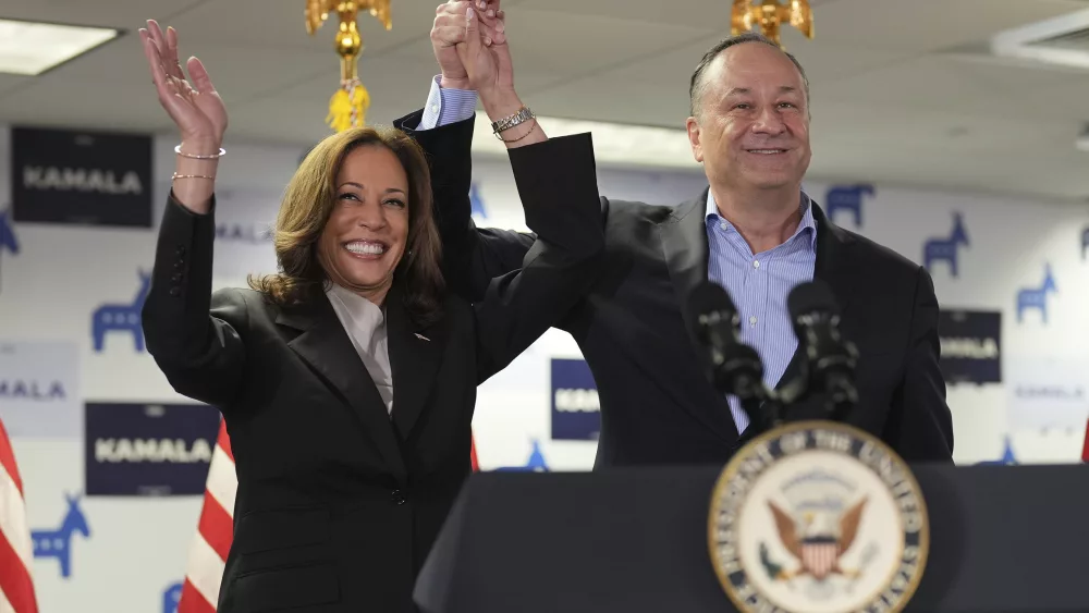 Vice President Kamala Harris, left, and second gentleman Doug Emhoff address staff at her campaign headquarters in Wilmington, Del., Monday, July 22, 2024. (Erin Schaff/The New York Times via AP, Pool)