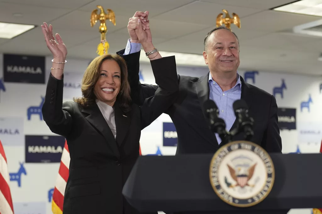 Vice President Kamala Harris, left, and second gentleman Doug Emhoff address staff at her campaign headquarters in Wilmington, Del., Monday, July 22, 2024. (Erin Schaff/The New York Times via AP, Pool)