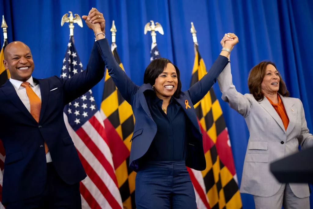 LANDOVER, MARYLAND - JUNE 7: (L-R) Maryland Gov. Wes Moore, Maryland Democratic candidate for U.S. Senate and Prince George's County Executive Angela Alsobrooks, and U.S. Vice President Kamala Harris stand on stage together after speaking at a campaign event on Gun Violence Awareness Day at Kentland Community Center on June 7, 2024 in Landover, Maryland. After winning a hard fought Democratic primary, Alsobrooks is challenging Larry Hogan, the popular Republican candidate who has served two terms as Maryland Governor, for U.S. Senate in Maryland. (Photo by Andrew Harnik/Getty Images)