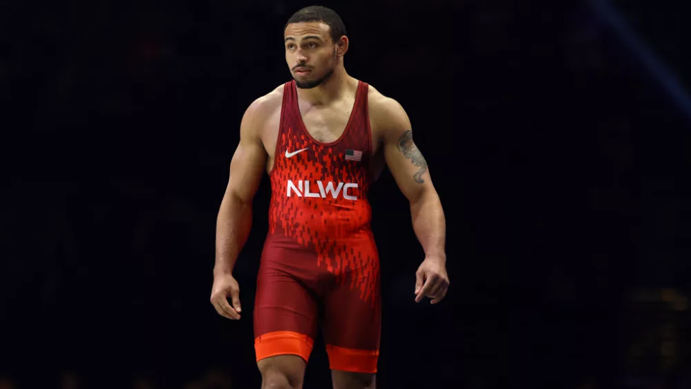 STATE COLLEGE, PENNSYLVANIA - APRIL 20: Aaron Brooks is introduced before a bout against David Taylor in the men's freestyle 86-KG division final during the US Olympic Wrestling Trials held at the Bryce Jordan Center on April 20, 2024 in State College, Pennsylvania. (Photo by Tim Nwachukwu/Getty Images)