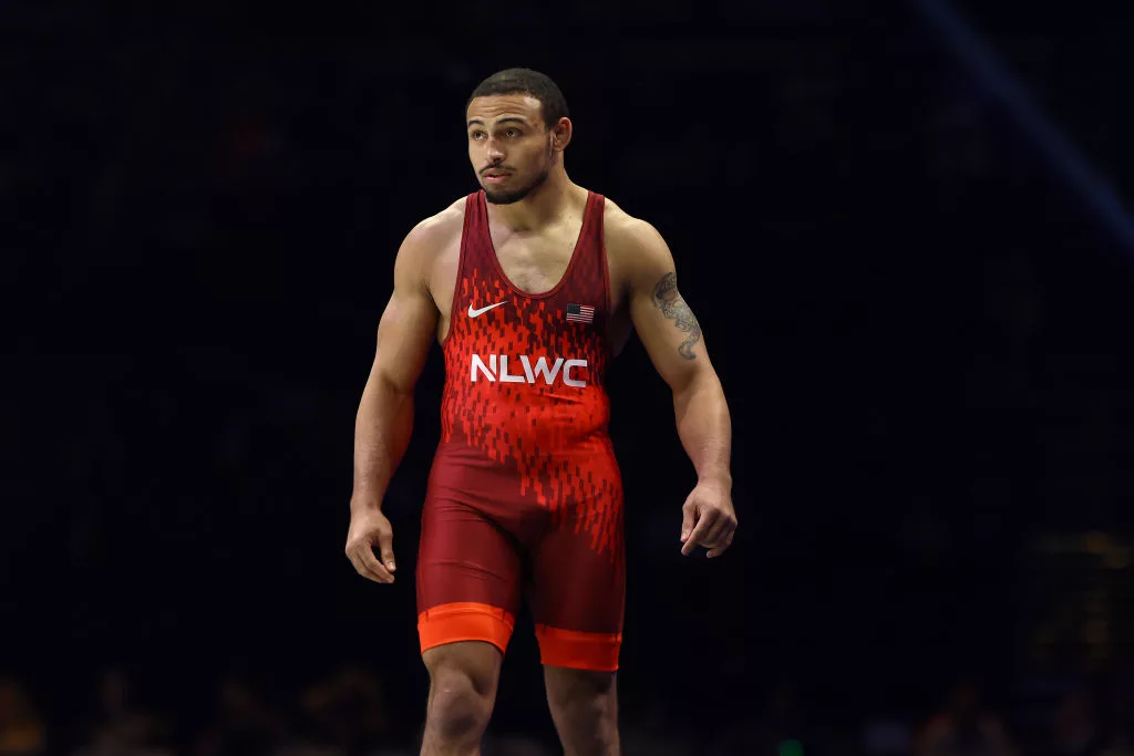 STATE COLLEGE, PENNSYLVANIA - APRIL 20: Aaron Brooks is introduced before a bout against David Taylor in the men's freestyle 86-KG division final during the US Olympic Wrestling Trials held at the Bryce Jordan Center on April 20, 2024 in State College, Pennsylvania. (Photo by Tim Nwachukwu/Getty Images)