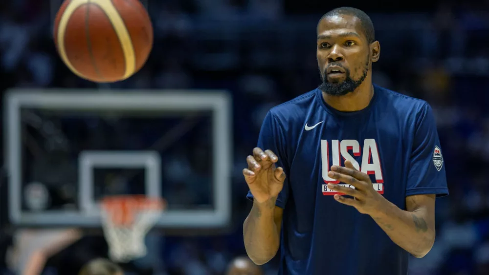 LONDON, ENGLAND: JULY 20: Kevin Durant #7 of the United States during team warm up before the USA V South Sudan, USA basketball showcase in preparation for the Paris Olympic Games at The O2 Arena on July 20th, 2024, in London, England. (Photo by Tim Clayton/Corbis via Getty Images)