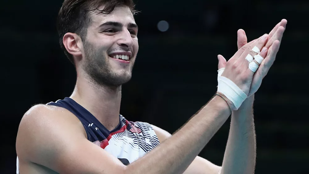 RIO DE JANEIRO, BRAZIL - AUGUST 11: Aaron Russell of the United States celebrates a victory against Brazil during the men's qualifying volleyball match between Brazil and United States on Day 6 of the Rio 2016 Olympic Games at the Maracanazinho on August 11, 2016 in Rio de Janeiro, Brazil. (Photo by Buda Mendes/Getty Images)