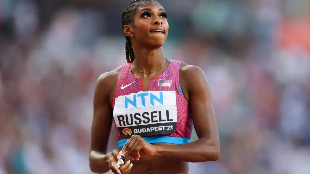 BUDAPEST, HUNGARY - AUGUST 22: Masai Russell of Team United States looks on after competing in the Heat 1 of Women's 100m Hurdles Qualification during day four of the World Athletics Championships Budapest 2023 at National Athletics Centre on August 22, 2023 in Budapest, Hungary. (Photo by Steph Chambers/Getty Images)