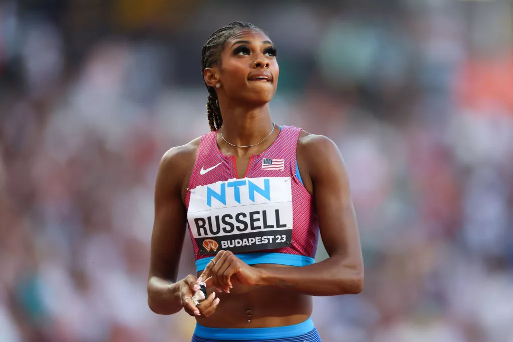 BUDAPEST, HUNGARY - AUGUST 22: Masai Russell of Team United States looks on after competing in the Heat 1 of Women's 100m Hurdles Qualification during day four of the World Athletics Championships Budapest 2023 at National Athletics Centre on August 22, 2023 in Budapest, Hungary. (Photo by Steph Chambers/Getty Images)