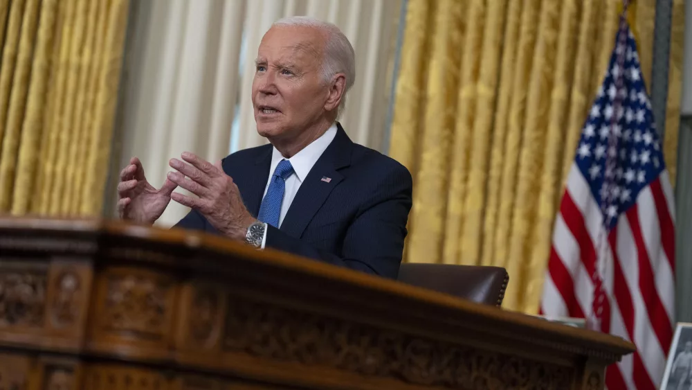 President Joe Biden addresses the nation from the Oval Office of the White House in Washington, Wednesday, July 24, 2024, about his decision to drop his Democratic reelection bid. (AP Photo/Evan Vucci, Pool)