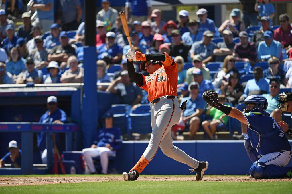 DUNEDIN, FLORIDA - MARCH 19, 2024: Coby Mayo #86 of the Baltimore Orioles bats during the fifth inning of a spring training game against the Toronto Blue Jays at TD Ballpark on March 19, 2024 in Dunedin, Florida. (Photo by George Kubas/Diamond Images via Getty Images)