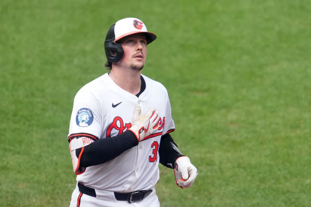 BALTIMORE, MD - AUGUST 18: Adley Rutschman #35 of the Baltimore Orioles celebrates a solo home run in the fifth inning during a baseball game against the Boston Red Sox at Oriole Park at Camden Yards on August 18, 2024 in Baltimore, Maryland. (Photo by Mitchell Layton/Getty Images)