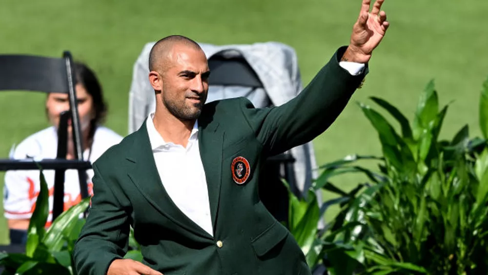 Former Baltimore Oriole Nick Markakis throws out the first pitch after being inducted into the Orioles Hall of Fame