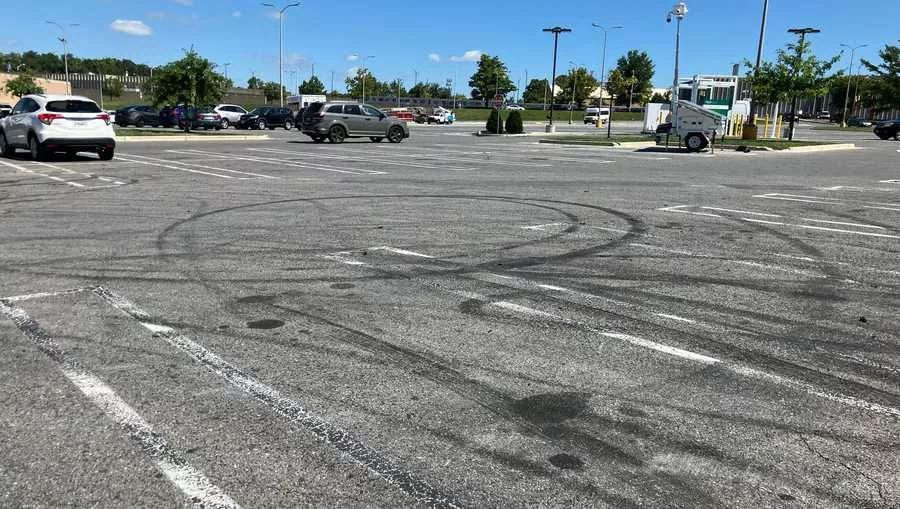 skid marks left in a parking lot in nw baltimore from an illegal car rally over the weekend. SOURCE: WBAL-TV\Kim Dacey