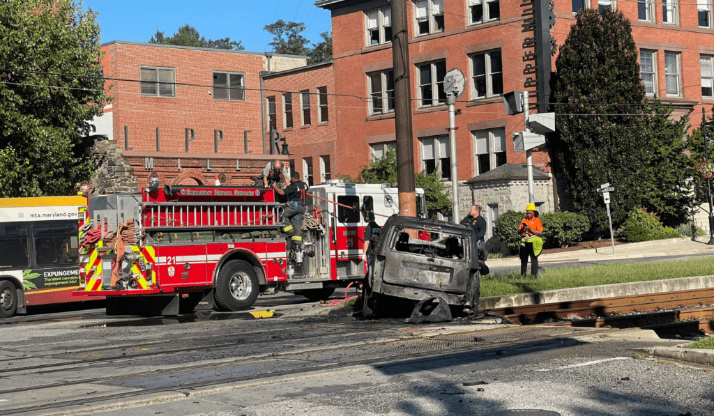 Car fire on light rail tracks injures one, temporarily closes station ...