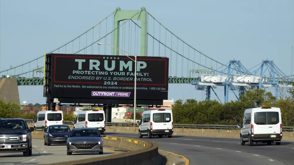 The motorcade of Democratic presidential nominee Vice President Kamala Harris passes a billboard in support of Republican presidential nominee former President Donald Trump Monday, Sept. 9, 2024, ahead of the presidential debate with Republican presidential nominee former President Donald Trump in Philadelphia. (AP Photo/Jacquelyn Martin) - Kamala Harris and Donald Trump are gearing up to take the stage for Tuesday night’s debate in Philadelphia, where they’ll fight to sway 2024 election voters on the biggest stage in U.S. politics. The event, at 9 p.m. Eastern, will offer Americans their most detailed look at a campaign that’s dramatically changed since the last debate in June.