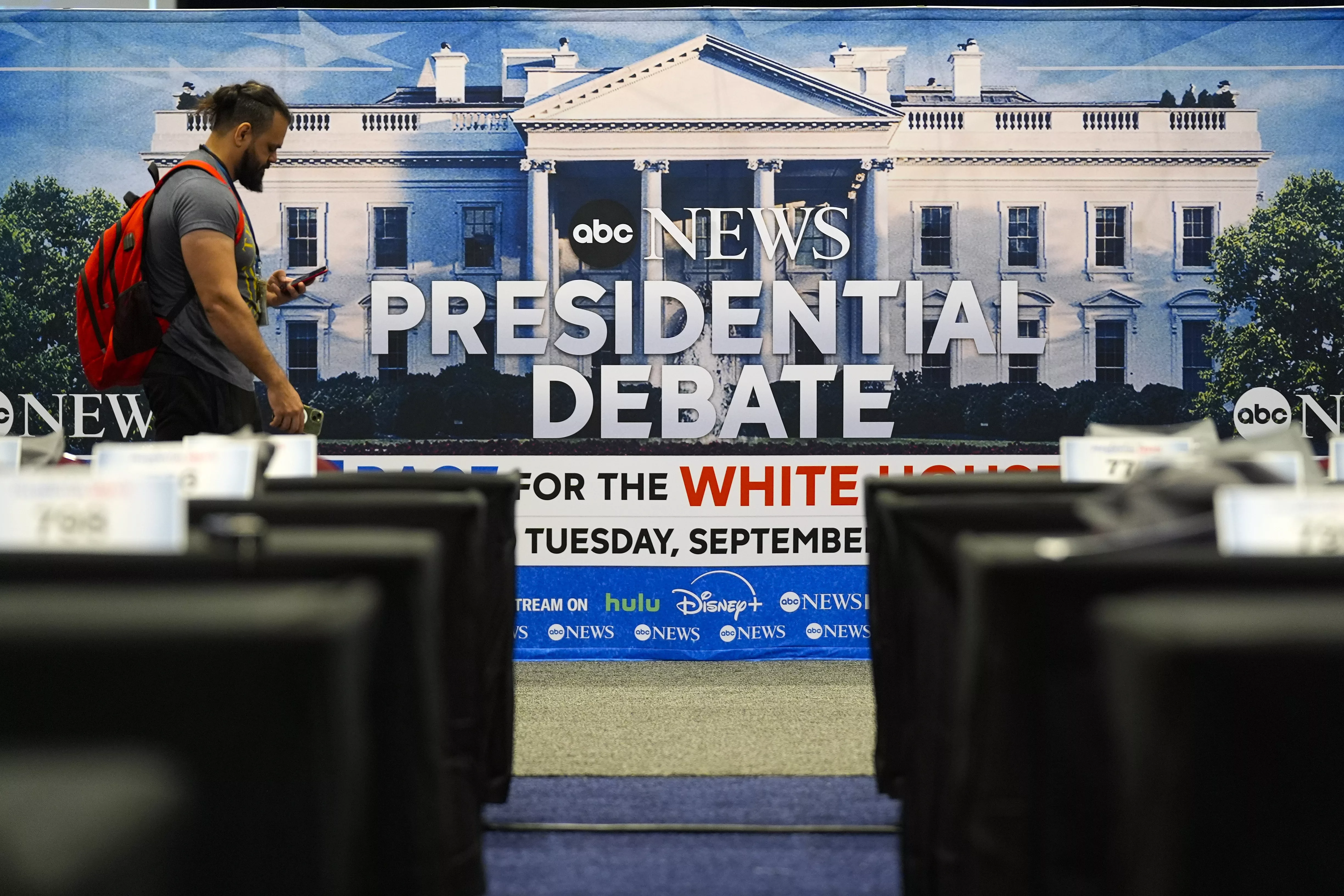 Signage at the media filing center ahead of tomorrow's presidential debate between Republican presidential candidate former President Donald Trump and Democratic presidential nominee Vice President Kamala Harris, Monday, Sept. 9, 2024, in Philadelphia. (AP Photo/Pablo Martinez Monsivais)