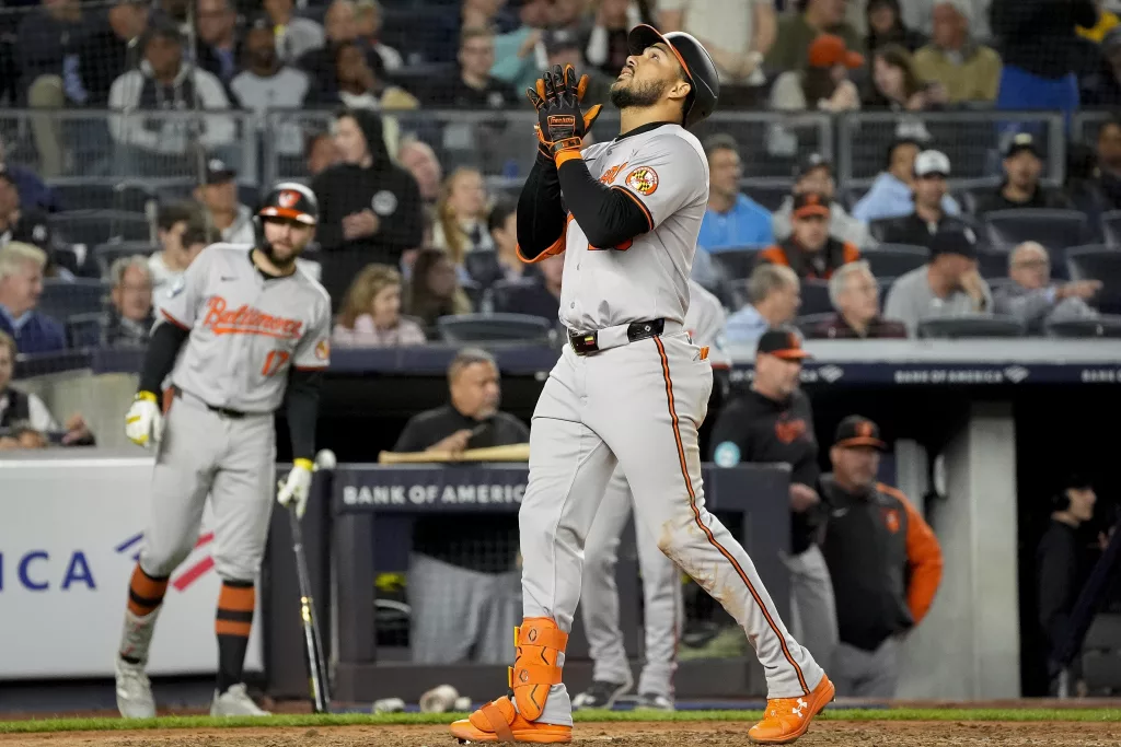 Baltimore Orioles' Anthony Santander crosses the plate after hitting a home run during the sixth inning of a baseball game against the New York Yankees, Tuesday, Sept. 24, 2024, in New York. (AP Photo/Bryan Woolston)