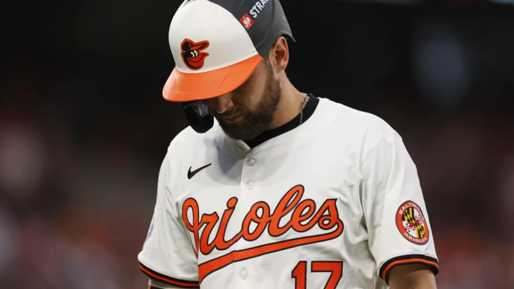 BALTIMORE, MARYLAND - OCTOBER 01: Colton Cowser #17 of the Baltimore Orioles reacts after flying out to center field against the Kansas City Royals during the ninth inning of Game One of the Wild Card Series at Oriole Park at Camden Yards on October 01, 2024 in Baltimore, Maryland. (Photo by Patrick Smith/Getty Images)