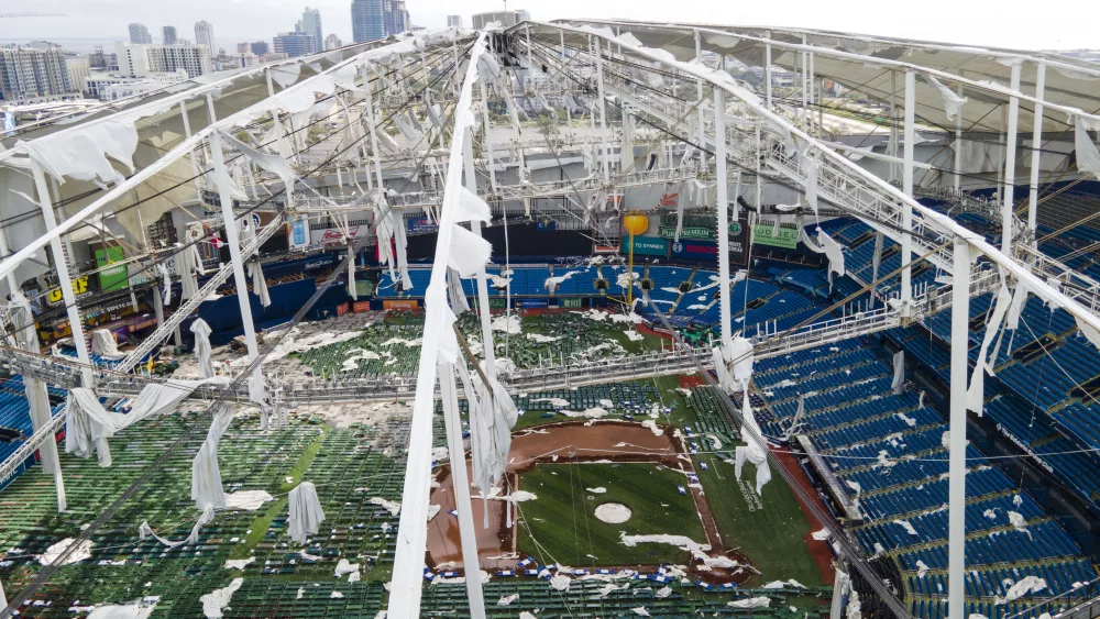 The roof of the Tropicana Field is damaged the morning after Hurricane Milton hit the region, Thursday, Oct. 10, 2024, in St. Petersburg, Fla. (AP Photo/Julio Cortez)