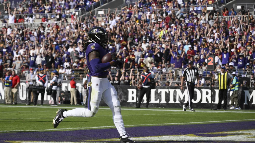 Lamar Jackson threw for 323 yards and a touchdown to outshine rookie Jayden Daniels and the Baltimore Ravens beat the Washington Commanders 30-23 for their fourth consecutive victory. Washington's winning streak ended at four. Derrick Henry ran for 132 yards and scored his NFL-leading eighth and ninth TDs. Mark Andrews found the end zone for the first time this season with a 13-yard reception from Jackson. Daniels connected with Terry McLaurin on two TDs but the Commanders struggled to get much of a running game going and could not contain Jackson and Henry.