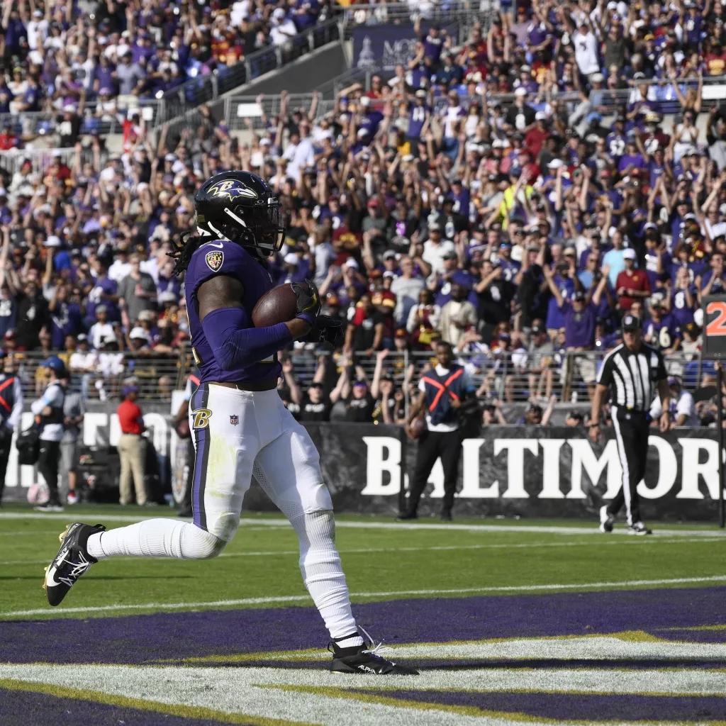 Lamar Jackson threw for 323 yards and a touchdown to outshine rookie Jayden Daniels and the Baltimore Ravens beat the Washington Commanders 30-23 for their fourth consecutive victory. Washington's winning streak ended at four. Derrick Henry ran for 132 yards and scored his NFL-leading eighth and ninth TDs. Mark Andrews found the end zone for the first time this season with a 13-yard reception from Jackson. Daniels connected with Terry McLaurin on two TDs but the Commanders struggled to get much of a running game going and could not contain Jackson and Henry.