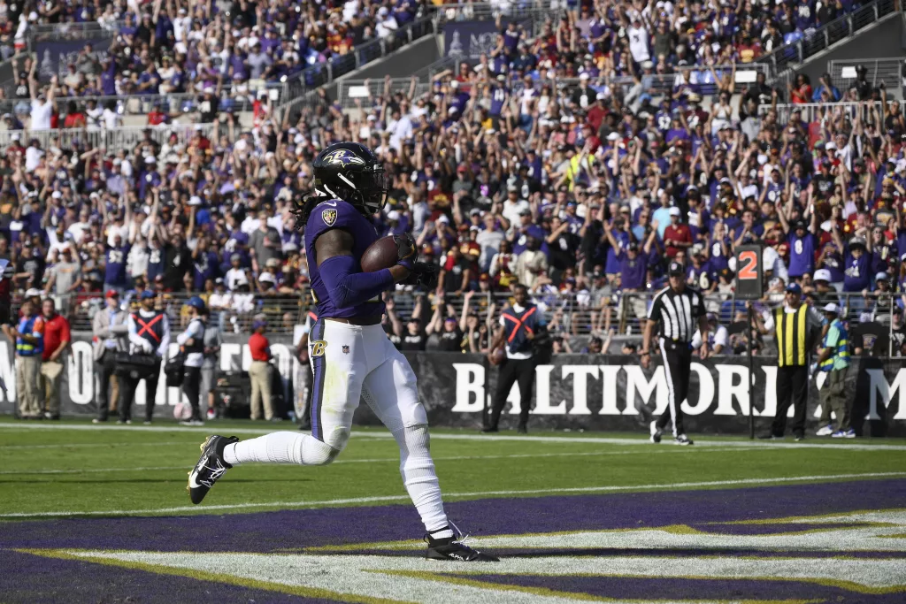 Lamar Jackson threw for 323 yards and a touchdown to outshine rookie Jayden Daniels and the Baltimore Ravens beat the Washington Commanders 30-23 for their fourth consecutive victory. Washington's winning streak ended at four. Derrick Henry ran for 132 yards and scored his NFL-leading eighth and ninth TDs. Mark Andrews found the end zone for the first time this season with a 13-yard reception from Jackson. Daniels connected with Terry McLaurin on two TDs but the Commanders struggled to get much of a running game going and could not contain Jackson and Henry.