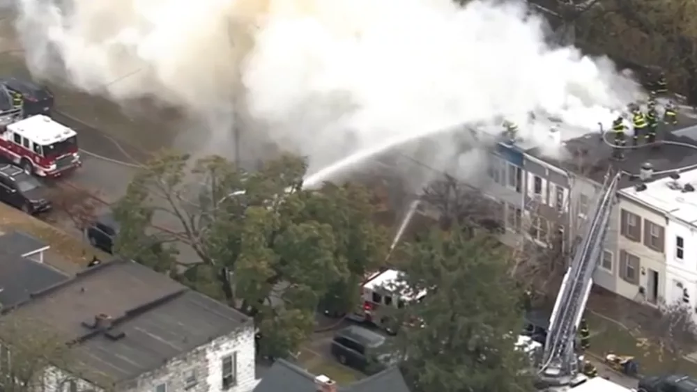 Several vacant rowhomes are on fire Friday afternoon in south Baltimore's Brooklyn neighborhood. Firefighters were called around 12:48 p.m. to the 400 block of Annabel Avenue, where as many as three units were fully engulfed in flames.