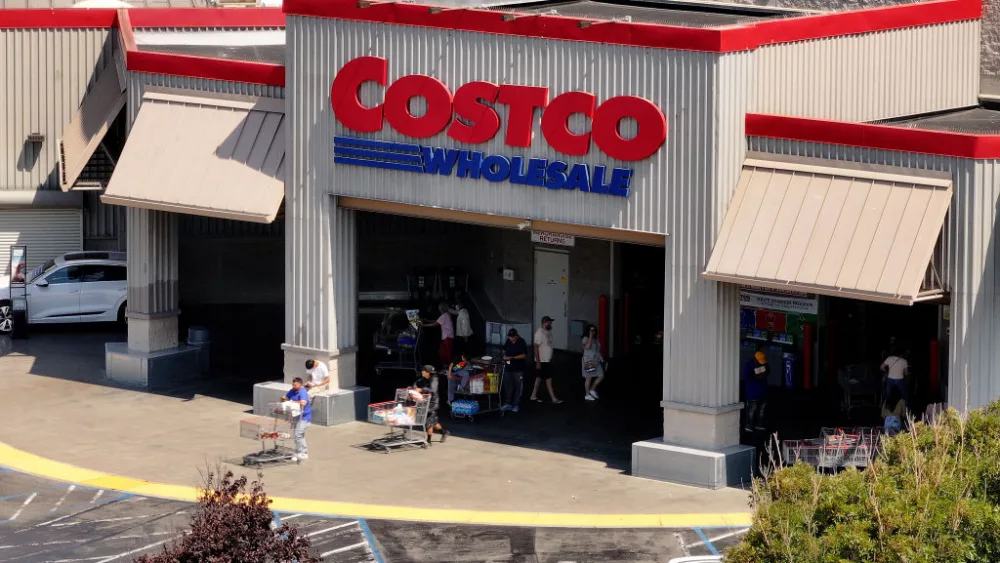 RICHMOND, CALIFORNIA - JULY 11: In an aerial view, the Costco logo is displayed on the exterior of a Costco store on July 11, 2024 in Richmond, California. Costco announced plans to raise membership fees for the first time since 2017 with a $5 jump to $65 a year from $60. (Photo by Justin Sullivan/Getty Images)