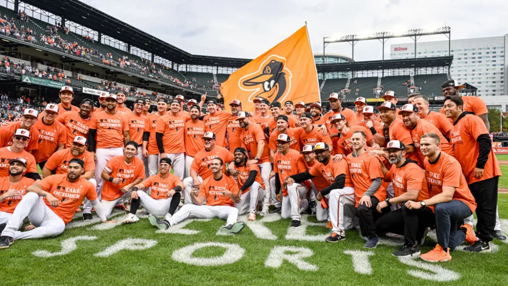 BALTIMORE, MD - September 17: The Baltimore Orioles pose of the field following the Tampa Bay Rays versus the Baltimore Orioles on September 17, 2023 at Oriole Park at Camden Yards in Baltimore, MD. after they clinched a playoff position. (Photo by Mark Goldman/Icon Sportswire via Getty Images)