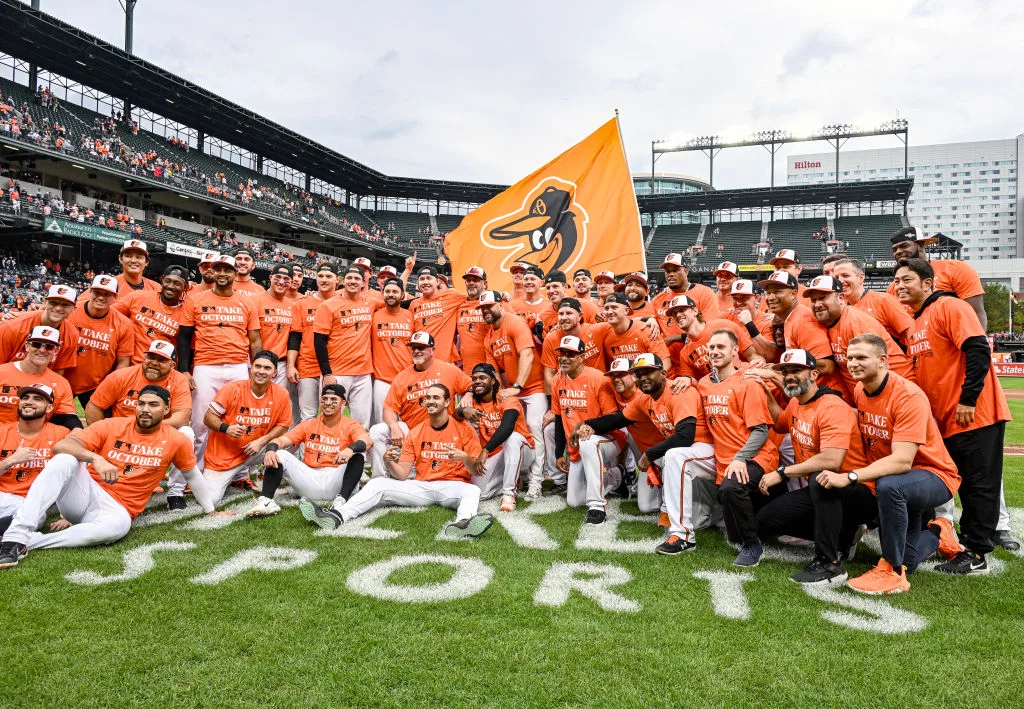 BALTIMORE, MD - September 17: The Baltimore Orioles pose of the field following the Tampa Bay Rays versus the Baltimore Orioles on September 17, 2023 at Oriole Park at Camden Yards in Baltimore, MD. after they clinched a playoff position. (Photo by Mark Goldman/Icon Sportswire via Getty Images)