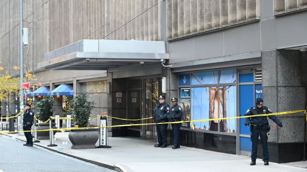 MANHATTAN, NEW YORK, UNITED STATES - DECEMBER 4: Police officers take security measures as CEO of UnitedHealthcare Brian Thompson shot and killed in Midtown Manhattan, New York, United States on December 4, 2024. The CEO of UnitedHealthcare was killed in a Midtown shooting near a hotel on 54th Street between 6th and 7th Avenues. He was rushed to an area hospital and later died. (Photo by Kyle Mazza/Anadolu via Getty Images)