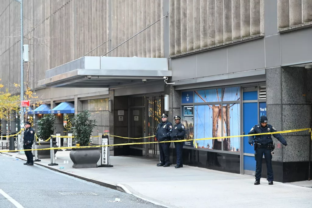 MANHATTAN, NEW YORK, UNITED STATES - DECEMBER 4: Police officers take security measures as CEO of UnitedHealthcare Brian Thompson shot and killed in Midtown Manhattan, New York, United States on December 4, 2024. The CEO of UnitedHealthcare was killed in a Midtown shooting near a hotel on 54th Street between 6th and 7th Avenues. He was rushed to an area hospital and later died. (Photo by Kyle Mazza/Anadolu via Getty Images)