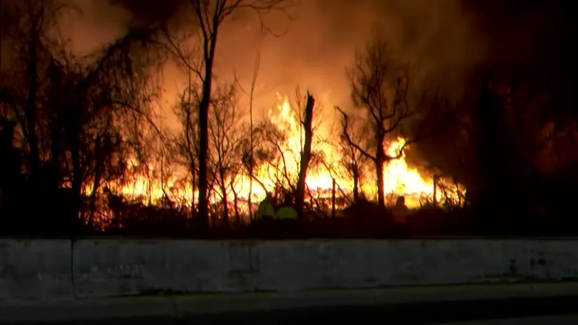 Massive Baltimore lumber yard fire contained, likely to smolder for days