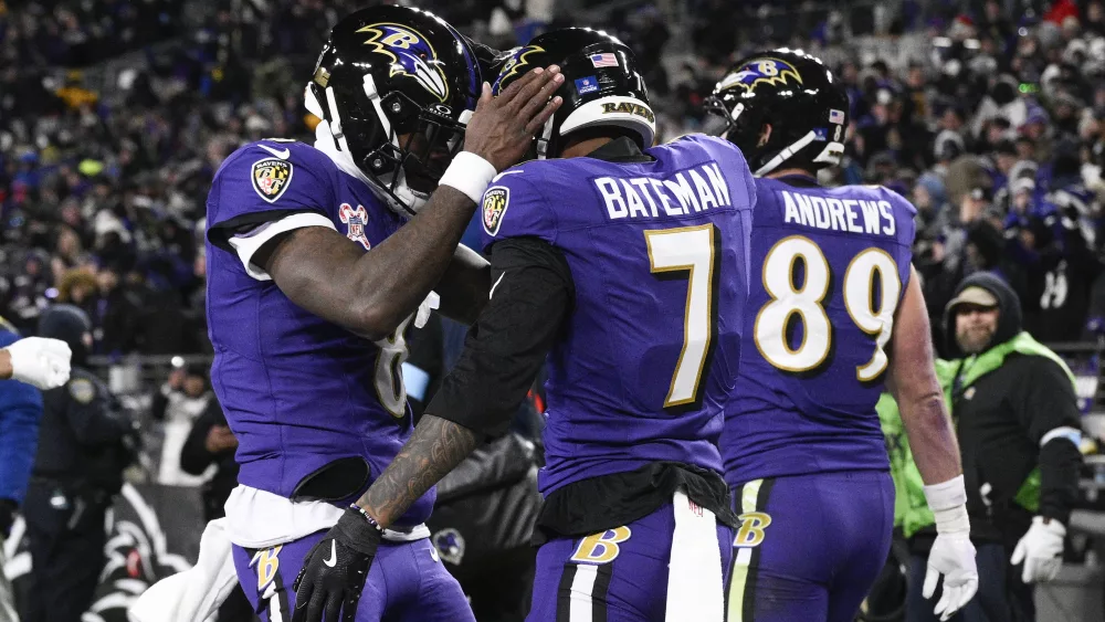 Lamar Jackson threw three touchdown passes and Marlon Humphrey scored on a fourth-quarter interception return to help the Baltimore Ravens pull even with Pittsburgh atop the AFC North with a 34-17 victory over the Steelers. Pittsburgh would have clinched the division with a victory, but now the teams are deadlocked after the Ravens won for just the second time in the last 10 games in this series. Baltimore clinched a playoff berth. The Steelers had already done so. Russell Wilson threw two touchdown passes for the Steelers but Humphrey's pick-6 gave the Ravens a big cushion in a series that's been razor-thin of late.