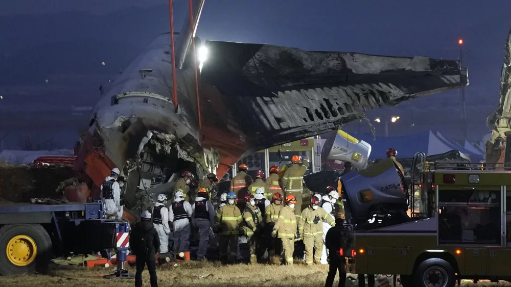 South Korean officials say a passenger plane burst into flames after it skidded off a runway at an airport and slammed into a concrete fence. Its front landing gear had apparently failed to deploy. All but two of the 181 people on board died, making it one of the country’s worst aviation disasters. The accident Sunday morning involved a Jeju Air passenger plane flying from Bangkok to the town of Muan, about 180 miles south of Seoul. The Transport Ministry said the plane was a 15-year-old Boeing 737-800 jet. Footage showed the plane skidding across the airstrip at high speed, apparently with its landing gear still closed, overrunning the runway and colliding head-on with the, triggering an explosion.