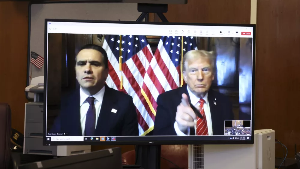 U.S. President-elect Donald Trump appears remotely for a sentencing hearing in front of New York State Judge Juan Merchan in the criminal case in which he was convicted in 2024 on charges involving hush money paid to a porn star, at New York Criminal Court in Manhattan in New York, Jan. 10, 2025. (Brendan McDermid via AP, Pool)