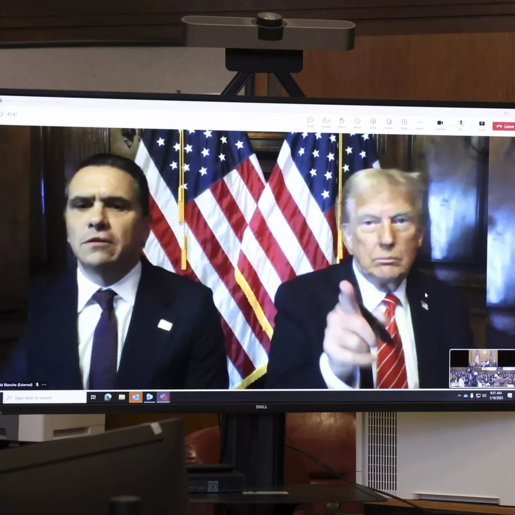 U.S. President-elect Donald Trump appears remotely for a sentencing hearing in front of New York State Judge Juan Merchan in the criminal case in which he was convicted in 2024 on charges involving hush money paid to a porn star, at New York Criminal Court in Manhattan in New York, Jan. 10, 2025. (Brendan McDermid via AP, Pool)