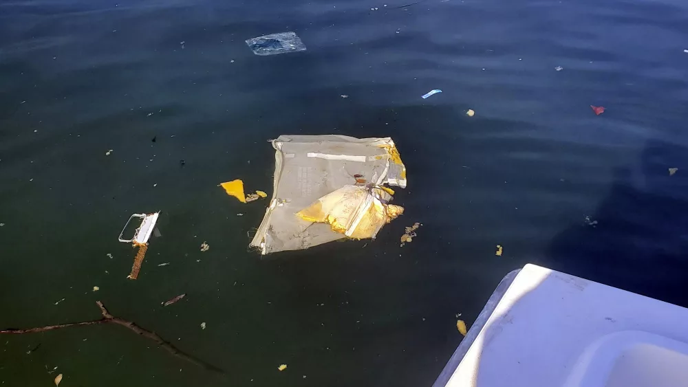 This image provided by Dean Naujoks shows debris floating in Potomac River south of Ronald Reagan Washington National Airport in Alexandria, Va., Thursday, Jan. 30, 2025. (Dean Naujoks via AP) Investigators are seeking clues into the deadly midair collision earlier this week that now stands as the deadliest aviation disaster in the U.S. almost a quarter century. The collision between an American Airlines passenger jet and an Army helicopter at Ronald Reagan Washington National Airport near Washington, D.C, late Wednesday killed 67 people, including more than a dozen figure skaters. More than 40 bodies have been recovered. Air crash investigations can take months - or longer. Investigators have declined to publicly speculate on the cause of the collision.