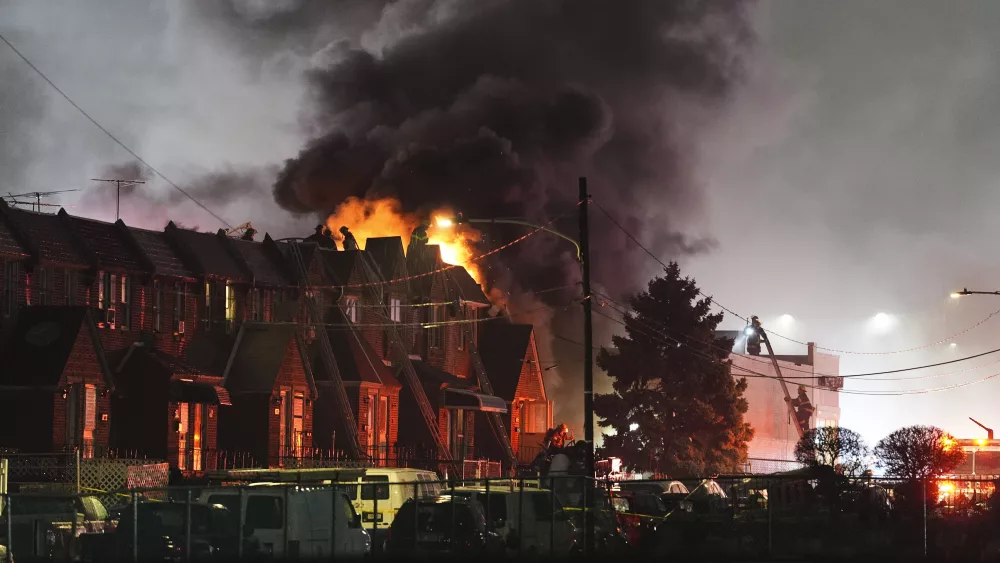 First responders work the scene after a small plane crashed in Philadelphia, Friday, Jan. 31, 2025. (AP Photo/Matt Rourke)