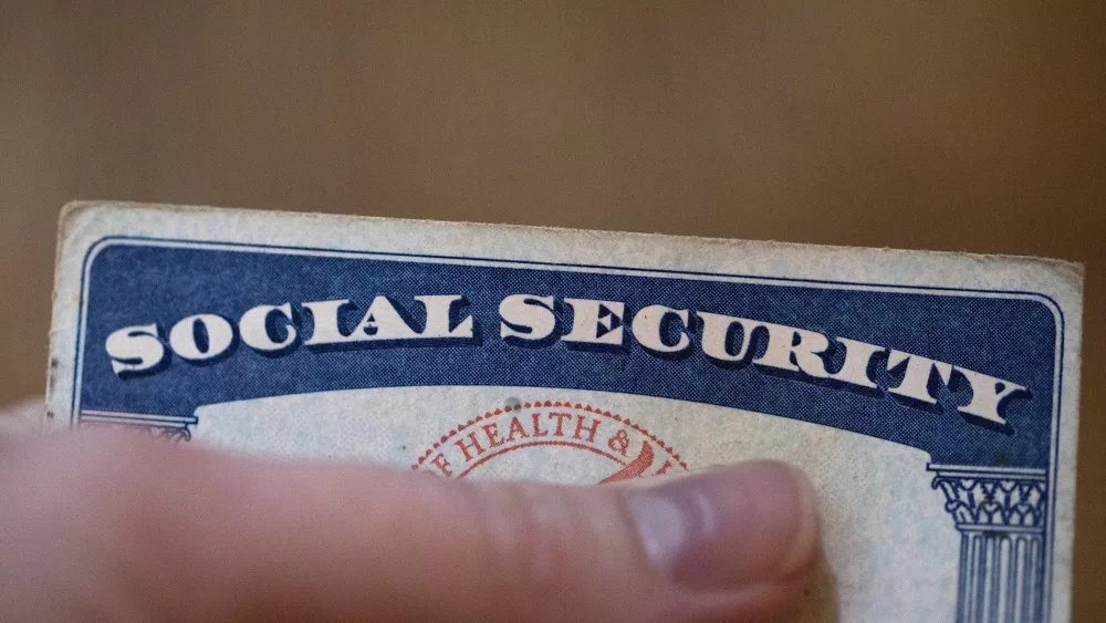 FILE - A Social Security card is displayed Oct. 12, 2021, in Tigard, Ore. (AP Photo/Jenny Kane, File)