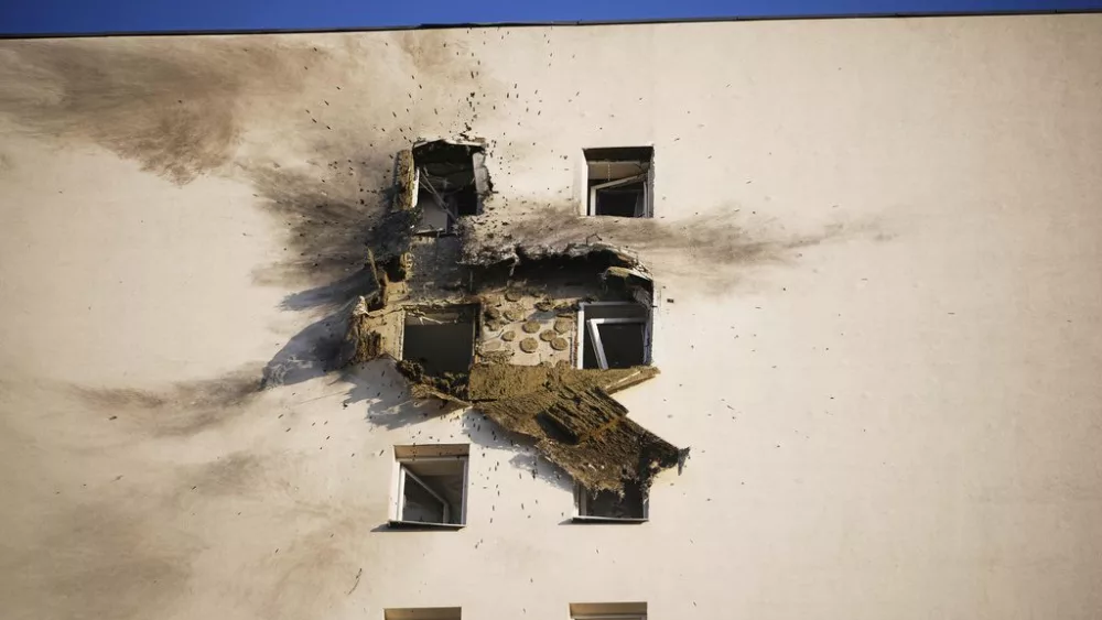 This photo shows an apartment building where the downed Ukrainian drone fell at an area in Sapronovo village outside Moscow, Russia, on Tuesday, March 11, 2025. (AP Photo)