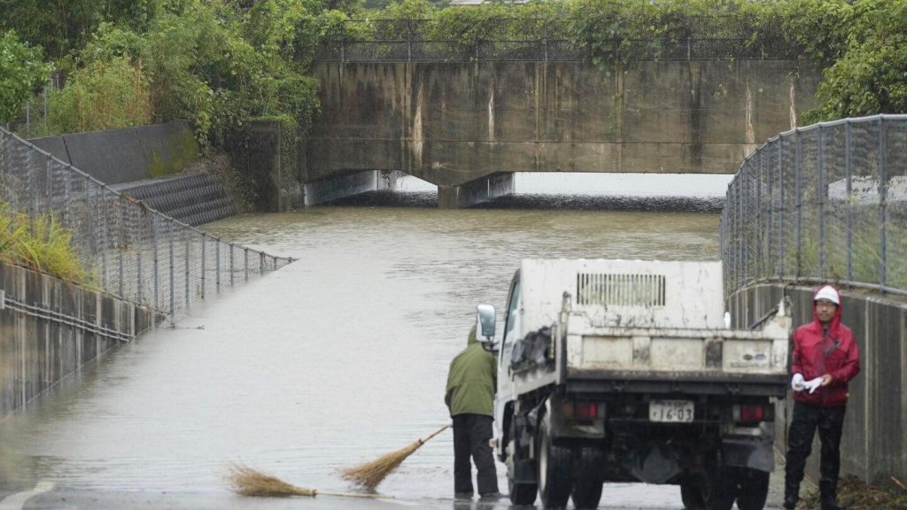 Heavy rains in southern Japan cause flooding and mudslides, and leave several people missing