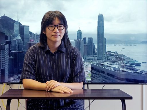 Hong Kong vigil organizer says she was seeking democracy, not end to Communist Party rule