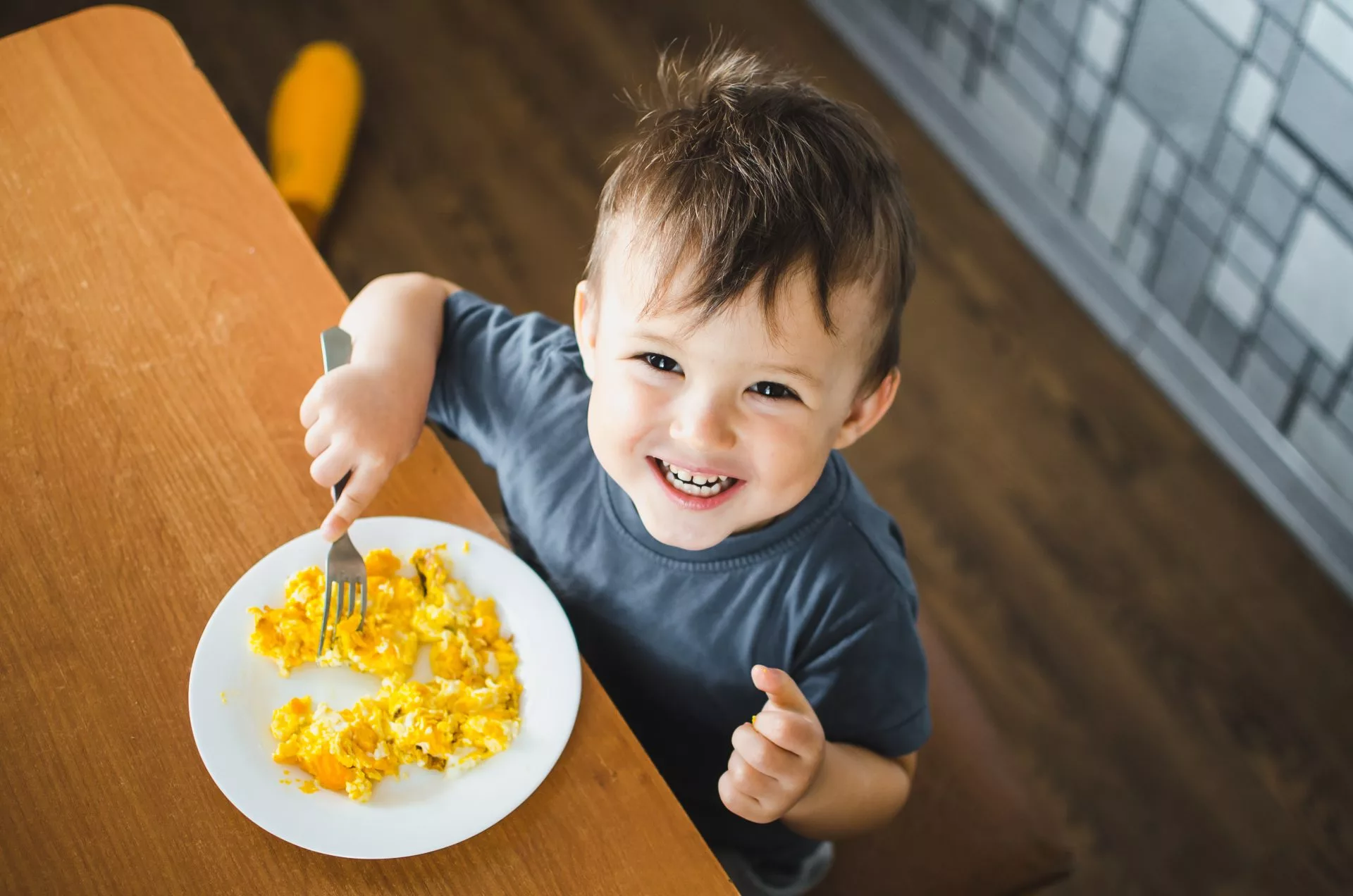 HATCH-FOR-HUNGER-CHILD-EATING-EGGS-OMELET