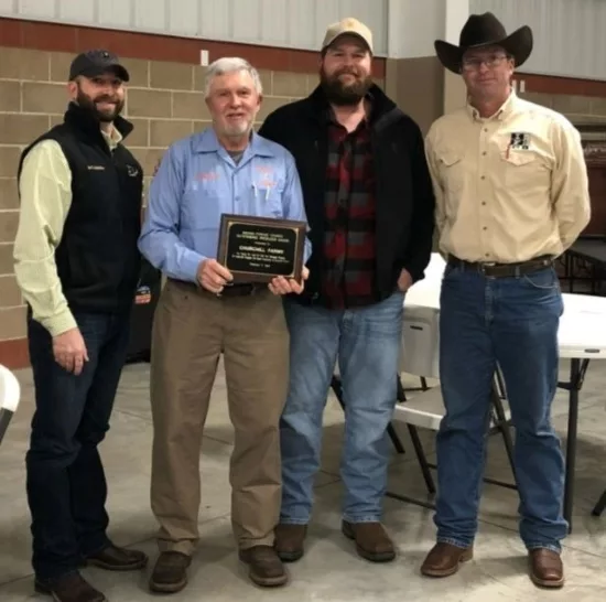 Two Outstanding Producer Award Recipients and two Indiana Forage Council representatives.