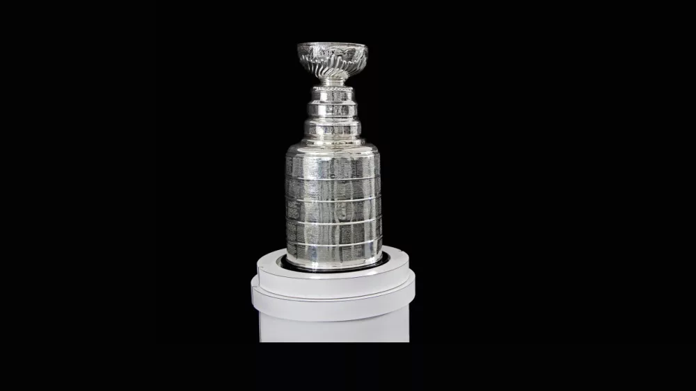 NHL Trophy - Silver Stanley Cup on white stand with black background^ in Vancouver BC on November 3^ 2018