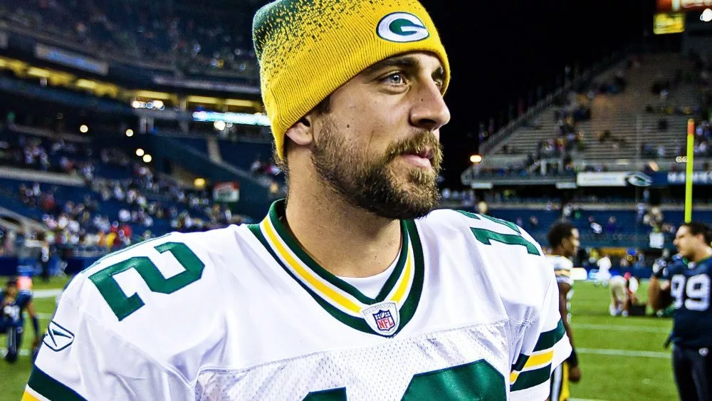 Quarterback Aaron Rodgers walks on Qwest Field after winning a football game August 21^ 2010 in Seattle^ Washington.