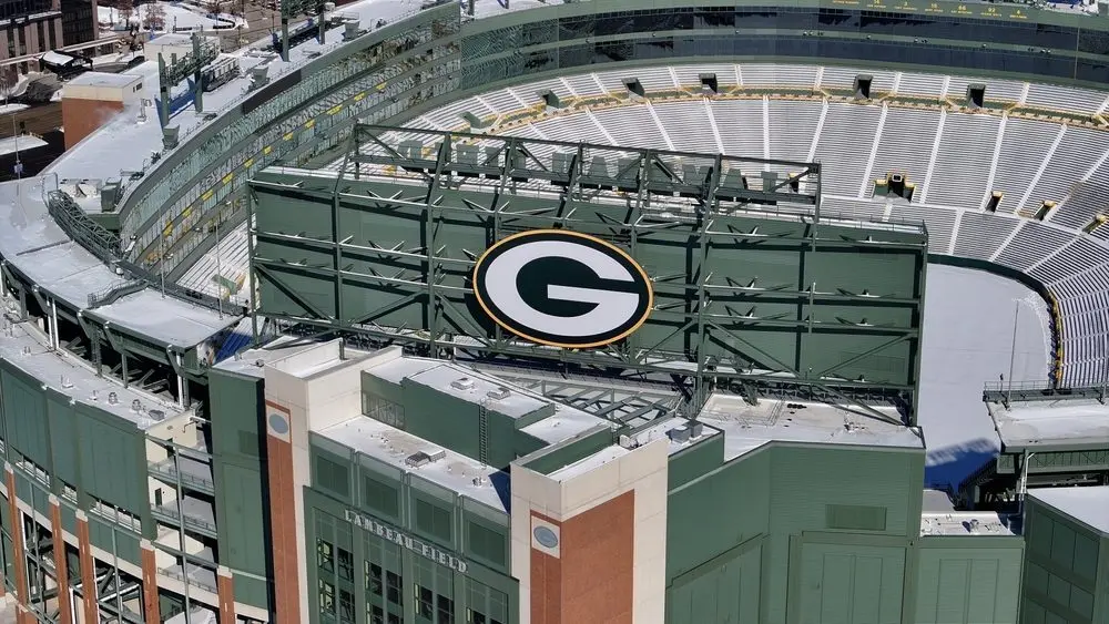 Feb 20^ 2025-Green Bay^ WI; An aerial view of Lambeau Field shows the iconic^ bowl-shaped stadium with its vast seating for 81^441 fans.