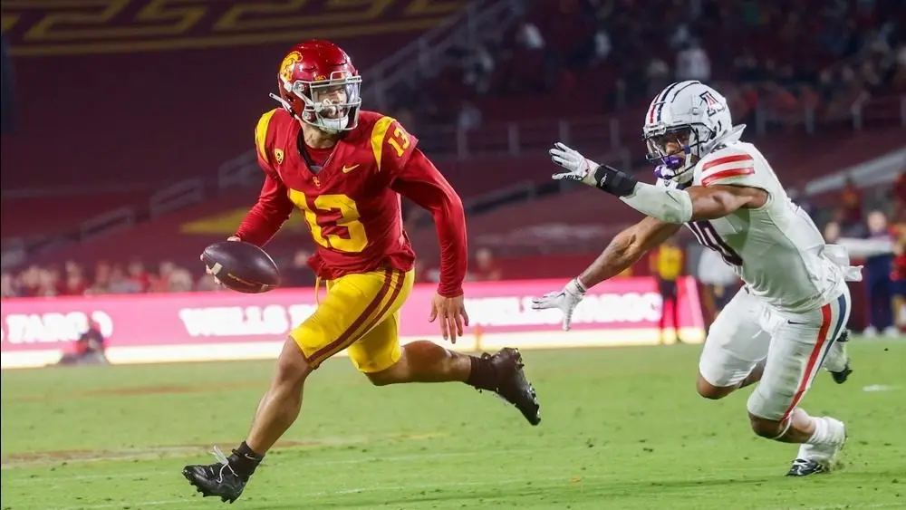 Southern California backmost Caleb Williams (13) runs the shot during an NCAA assemblage shot crippled against the Arizona^ Oct. 7^ 2023 successful Los Angeles