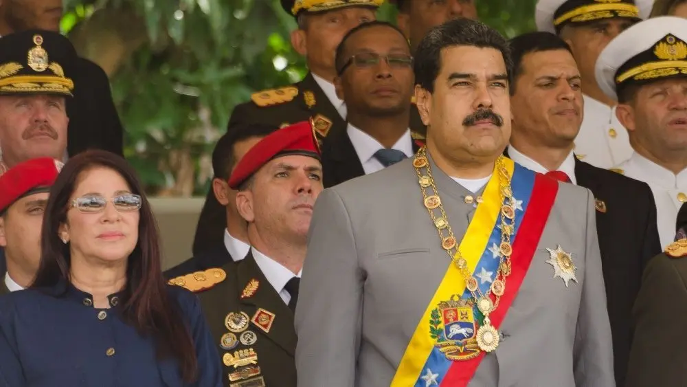 President of Venezuela^ Nicolás Maduro with First Lady Cilia Flores in a military parade. Caracas. February 1^ 2017