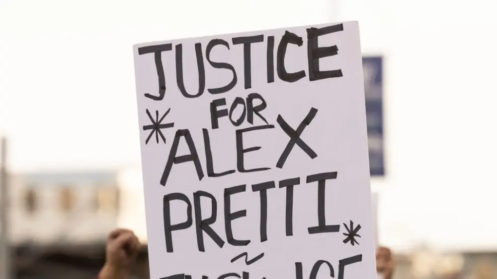 People protest the ICE killing of Alex Pretti in front of the downtown Federal Building. Los Angeles^ California^ USA - January 25^ 2026