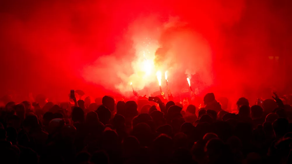 football-fans-lit-up-the-lights-and-smoke-bombs-revolution-pro-2